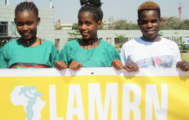 Girls with LAMRN banner